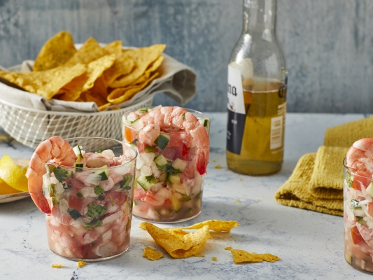 two cups of ceviche and a mexican beer